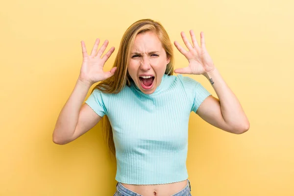 Young Adult Blonde Woman Screaming Panic Anger Shocked Terrified Furious — ストック写真