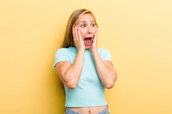 Young Adult Blonde Woman Feeling Happy Excited Surprised Looking Side — Stockfoto