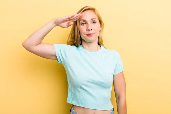 Young Adult Blonde Woman Greeting Camera Military Salute Act Honor — 스톡 사진