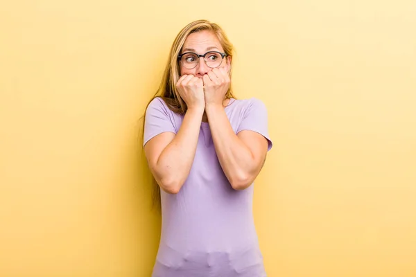 Young Adult Blonde Woman Looking Worried Anxious Stressed Afraid Biting — Stockfoto