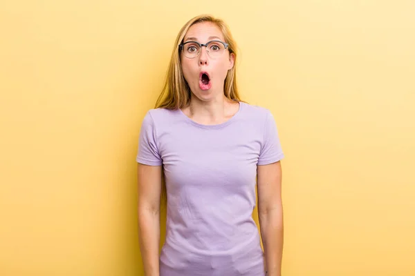 Young Adult Blonde Woman Looking Very Shocked Surprised Staring Open — Foto Stock