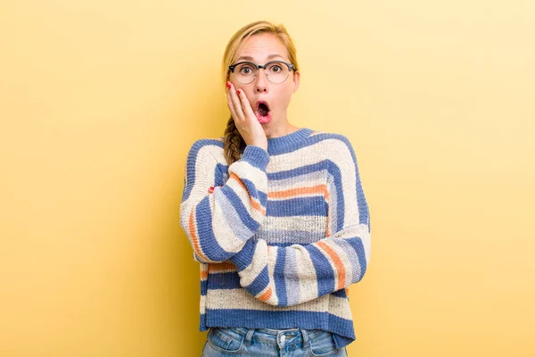 Young Adult Blonde Woman Open Mouthed Shock Disbelief Hand Cheek — Foto Stock