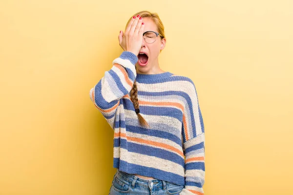 Young Adult Blonde Woman Looking Sleepy Bored Yawning Headache One — Stockfoto