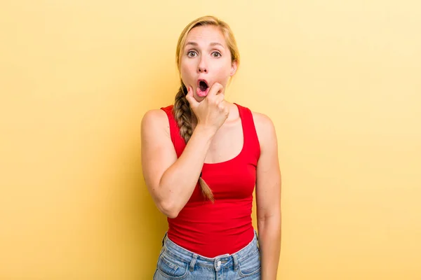 Young Adult Blonde Woman Mouth Eyes Wide Open Hand Chin — Stock Photo, Image