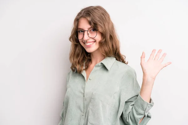 Teenager Young Girl Smiling Happily Cheerfully Waving Hand Welcoming Greeting — Stock fotografie