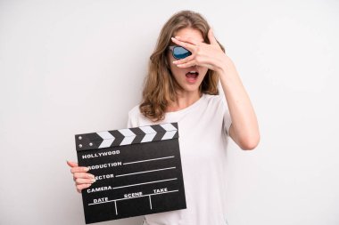 young girl with a cinema clapper. film or movie concept