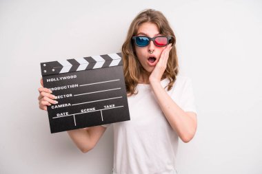 young girl with a cinema clapper. film or movie concept