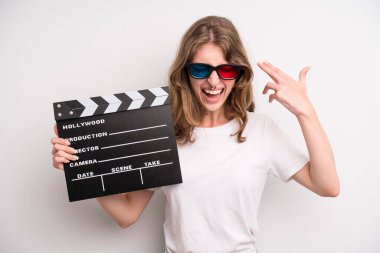 young girl with a cinema clapper. film or movie concept