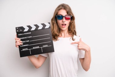 young girl with a cinema clapper. film or movie concept