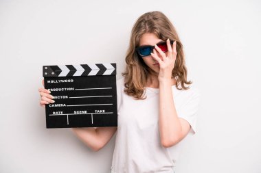 young girl with a cinema clapper. film or movie concept