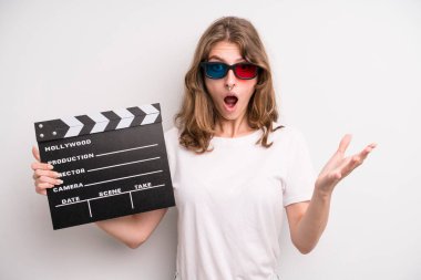 young girl with a cinema clapper. film or movie concept