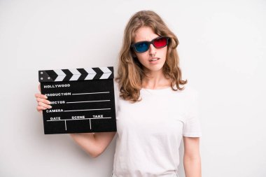 young girl with a cinema clapper. film or movie concept