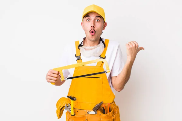 Young Adult Handsome Man Saw Handyman Concept — 图库照片