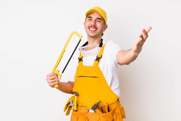 Young Adult Handsome Man Saw Handyman Concept — Fotografia de Stock