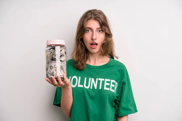 Young Girl Donation Banknotes Bottle Volunteer Concept — Stok fotoğraf