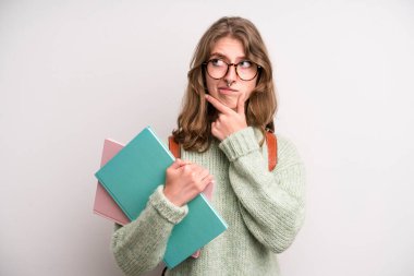 young girl with books. university student concenpt