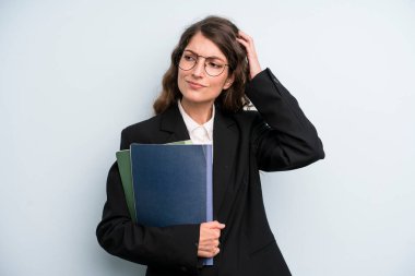 pretty young adult woman with notebooks. business concept