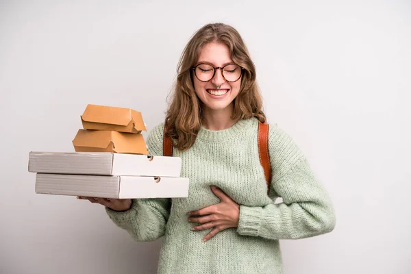 young girl with pizzas and burgers. take away fast food concept