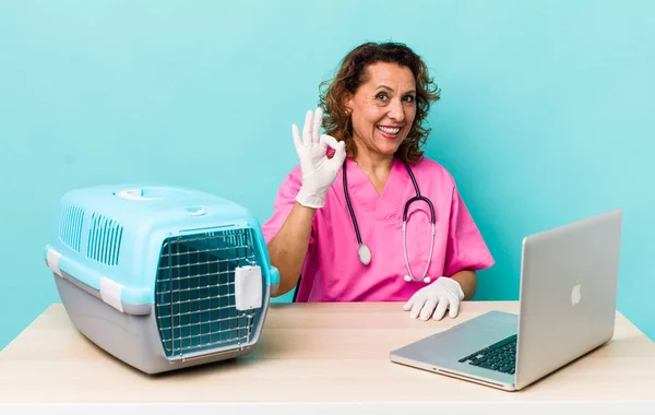 Middle Age Woman Feeling Happy Showing Approval Okay Gesture Veterinarian — Zdjęcie stockowe