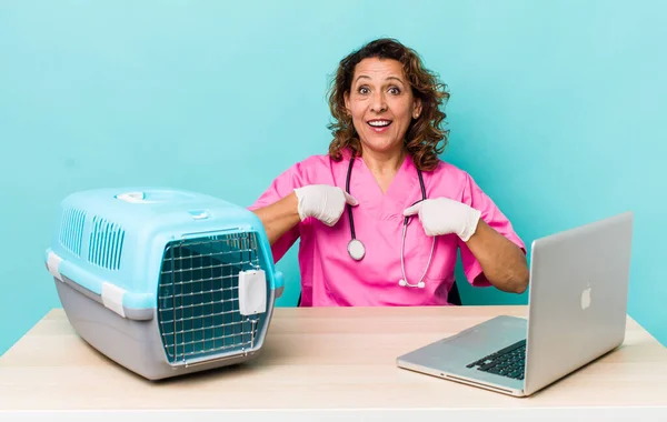 Middle Age Woman Feeling Happy Pointing Self Excited Veterinarian Concept — Stockfoto