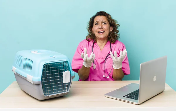 Middle Age Woman Looking Desperate Frustrated Stressed Veterinarian Concept — Stockfoto
