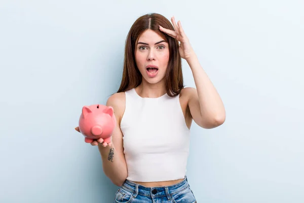 Young Adult Pretty Woman Piggy Bank — Stockfoto