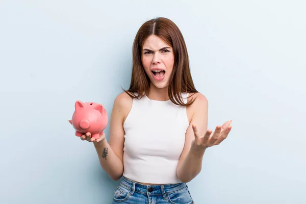 Young Adult Pretty Woman Piggy Bank — Stockfoto