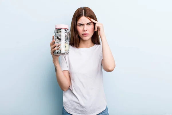 Young Adult Pretty Woman Piggy Bank — Stockfoto