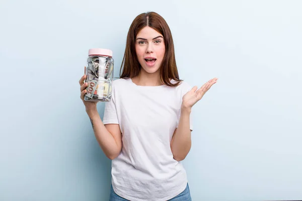 Young Adult Pretty Woman Piggy Bank — Stockfoto