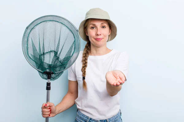 young adult blonde woman. fisher with a net and summer concept