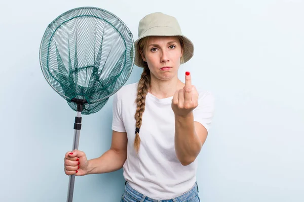 young adult blonde woman. fisher with a net and summer concept