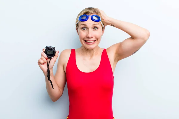 young adult blonde woman. swimmer concept