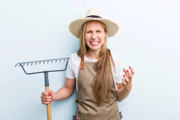 Young Adult Blonde Woman Farmer Rake — Foto Stock