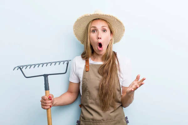 Young Adult Blonde Woman Farmer Rake —  Fotos de Stock