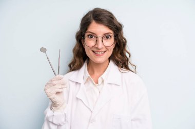 young adult pretty woman. dentist concept