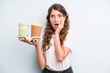 young adult pretty woman. take away coffee concept