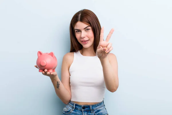 Young Adult Pretty Woman Piggy Bank Savings Concept — Stockfoto