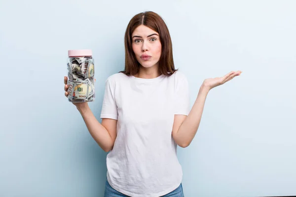 Young Adult Pretty Woman Holding Her Savings Bottle — Stock fotografie