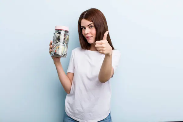 Young Adult Pretty Woman Holding Her Savings Bottle — Fotografia de Stock