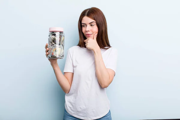 Young Adult Pretty Woman Holding Her Savings Bottle — Stok fotoğraf
