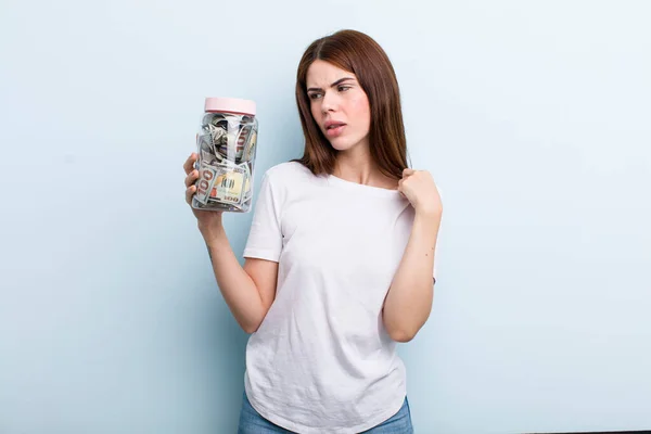 Young Adult Pretty Woman Holding Her Savings Bottle — Stockfoto