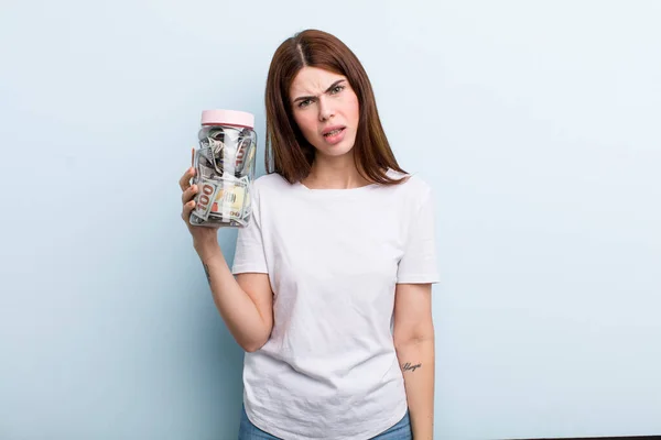 Young Adult Pretty Woman Holding Her Savings Bottle —  Fotos de Stock