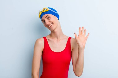 young adult pretty woman swimmer concept