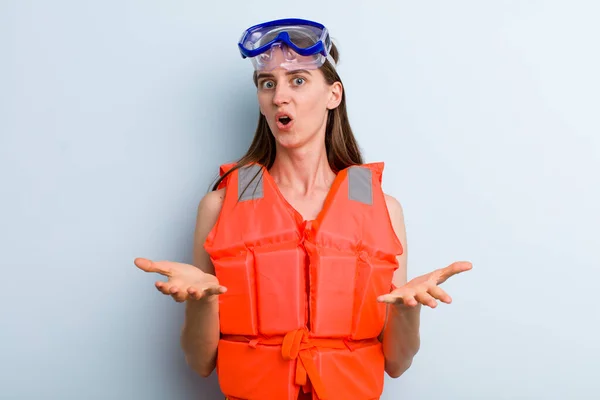young adult pretty woman life jacket and summer concept