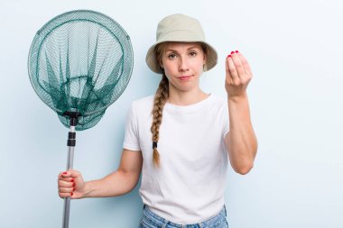 young adult blonde fisher woman with a net. holidays and hobbie concept