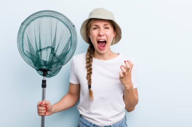 young adult blonde fisher woman with a net. holidays and hobbie concept