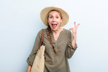 young adult blonde woman. holidays and summer concept