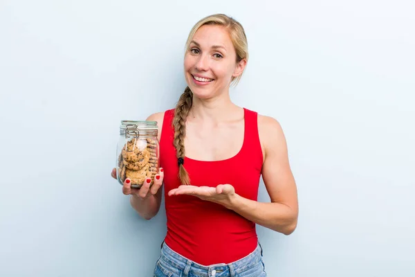 Young Adult Blonde Woman Home Made Cookies Bottle — 图库照片