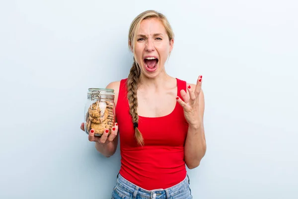 Young Adult Blonde Woman Home Made Cookies Bottle — Stockfoto