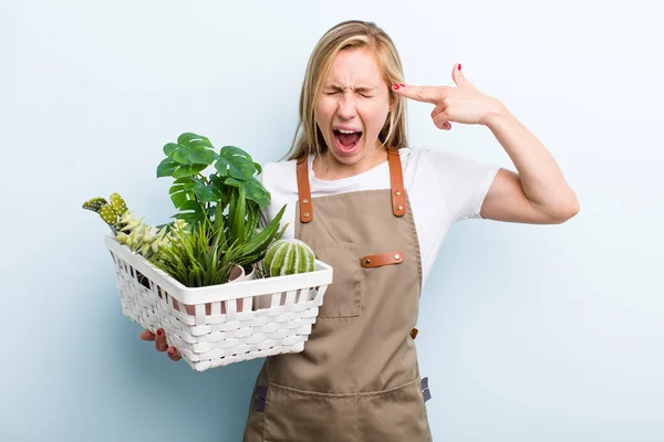 Young Adult Blonde Woman Gardering Plants — Foto Stock